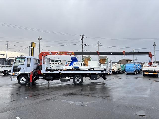 ヒノレンジャー 　クレーン付セルフローダー　上物古河ユニック　４段ブーム　ラジコン（無線）　フックイン　２．９ｔ吊　角足＆差し違いアウトリガー　積載１．６５ｔ　荷台寸法５６４×２１０×９　荷台床鉄板張り　スライドボディ（7枚目）