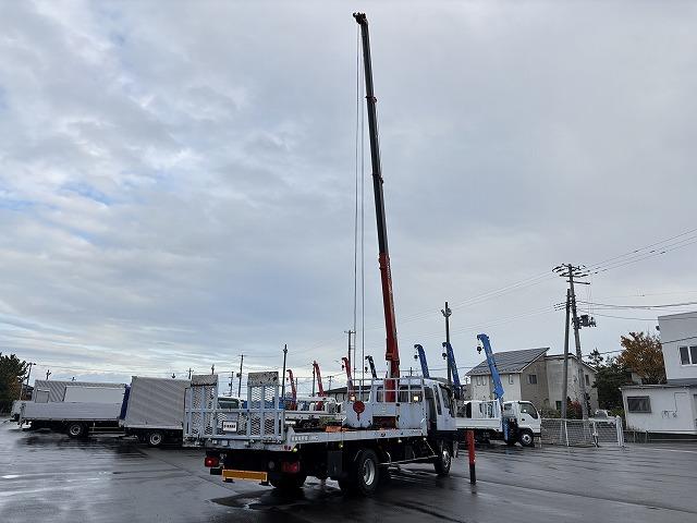 ヒノレンジャー 　クレーン付セルフローダー　上物古河ユニック　４段ブーム　ラジコン（無線）　フックイン　２．９ｔ吊　角足＆差し違いアウトリガー　積載１．６５ｔ　荷台寸法５６４×２１０×９　荷台床鉄板張り　スライドボディ（8枚目）