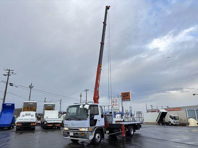 ヒノレンジャー 　クレーン付セルフローダー　上物古河ユニック　４段ブーム　ラジコン（無線）　フックイン　２．９ｔ吊　角足＆差し違いアウトリガー　積載１．６５ｔ　荷台寸法５６４×２１０×９　荷台床鉄板張り　スライドボディ（11枚目）