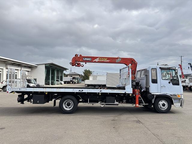 ヒノレンジャー 　クレーン付セルフローダー　上物古河ユニック　４段ブーム　ラジコン（無線）　フックイン　２．９ｔ吊　角足＆差し違いアウトリガー　積載１．６５ｔ　荷台寸法５６４×２１０×９　荷台床鉄板張り　スライドボディ（15枚目）