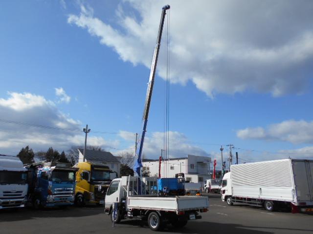 キャンター 　クレーン付き平ボディ　上物タダノ製　４段ブーム　ラジコン（無線）　フックイン　セミロングボディ　荷台寸法２９１ｘ１７９ｘ３７　荷台床木張り　走行１０．９万ｋｍ　５速ミッション（20枚目）