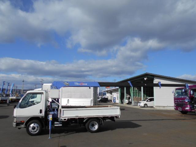 キャンター 　クレーン付き平ボディ　上物タダノ製　４段ブーム　ラジコン（無線）　フックイン　セミロングボディ　荷台寸法２９１ｘ１７９ｘ３７　荷台床木張り　走行１０．９万ｋｍ　５速ミッション（31枚目）