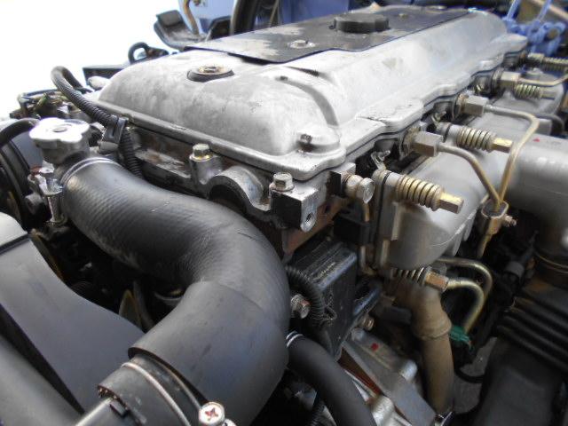 キャンター 　クレーン付き平ボディ　上物タダノ製　４段ブーム　ラジコン（無線）　フックイン　セミロングボディ　荷台寸法２９１ｘ１７９ｘ３７　荷台床木張り　走行１０．９万ｋｍ　５速ミッション（52枚目）