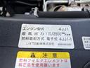 　ＰＧクレーン付き平ボディ　上物タダノクレーン　３段ブーム　フックイン　２．３ｔ吊り　荷台寸法３７２ｘ１８０ｘ３７　荷台床鉄板＆板張り　積載２．４ｔ　極東製　跳上パワーゲート付　ＰＧリモコン付（56枚目）