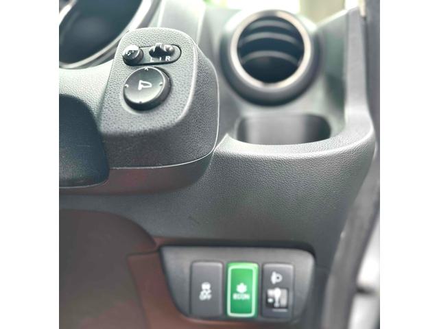 フィットシャトルハイブリッド ハイブリッド ファインライン ETC バックカメラ ナビ TV オートクルーズコントロール 電動格納ミラー CVT 盗難防止システム 衝突安全ボディ アルミホイール CD DVD再生 USB ABS ESC エアコン(17枚目)