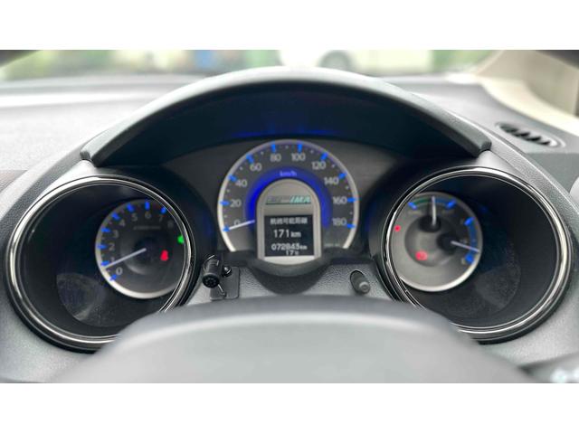 フィットシャトルハイブリッド ハイブリッド ファインライン ETC バックカメラ ナビ TV オートクルーズコントロール 電動格納ミラー CVT 盗難防止システム 衝突安全ボディ アルミホイール CD DVD再生 USB ABS ESC エアコン(18枚目)