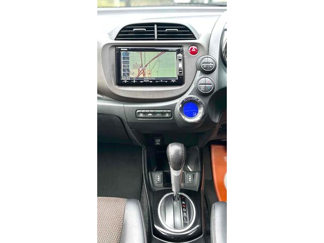 フィットシャトルハイブリッド ハイブリッド ファインライン ETC バックカメラ ナビ TV オートクルーズコントロール 電動格納ミラー CVT 盗難防止システム 衝突安全ボディ アルミホイール CD DVD再生 USB ABS ESC エアコン(24枚目)