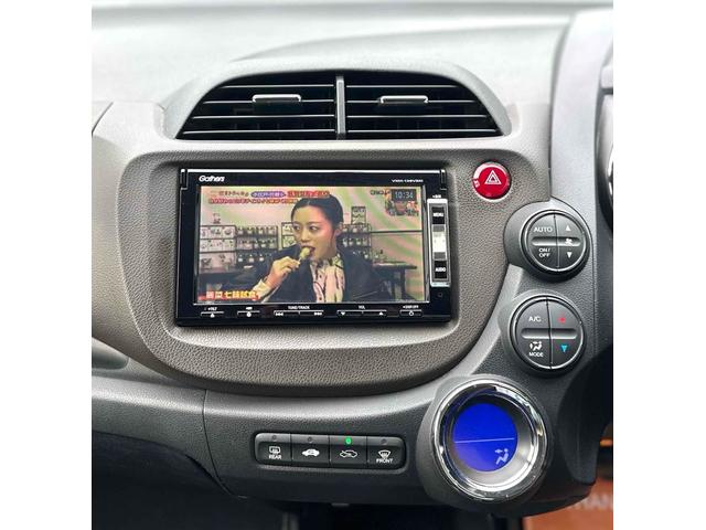 フィットシャトルハイブリッド ハイブリッド ファインライン ETC バックカメラ ナビ TV オートクルーズコントロール 電動格納ミラー CVT 盗難防止システム 衝突安全ボディ アルミホイール CD DVD再生 USB ABS ESC エアコン(28枚目)