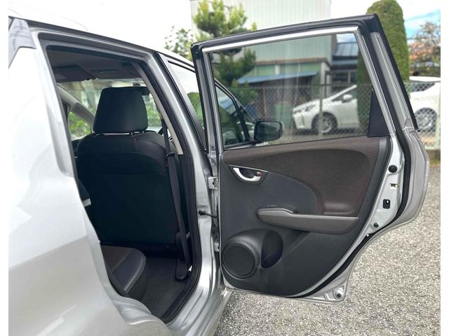 フィットシャトルハイブリッド ハイブリッド ファインライン ETC バックカメラ ナビ TV オートクルーズコントロール 電動格納ミラー CVT 盗難防止システム 衝突安全ボディ アルミホイール CD DVD再生 USB ABS ESC エアコン(32枚目)