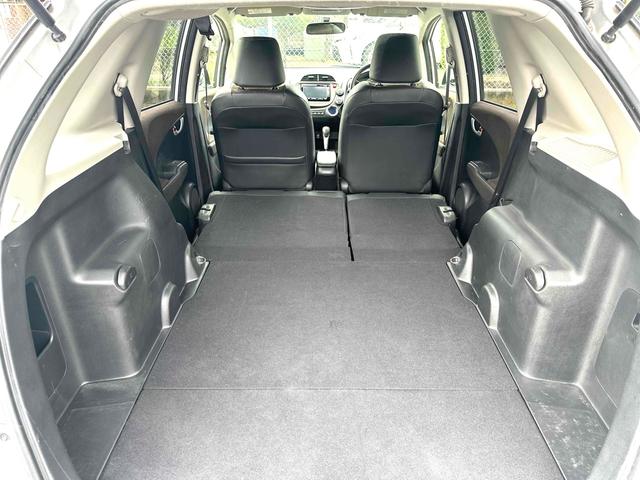 フィットシャトルハイブリッド ハイブリッド ファインライン ETC バックカメラ ナビ TV オートクルーズコントロール 電動格納ミラー CVT 盗難防止システム 衝突安全ボディ アルミホイール CD DVD再生 USB ABS ESC エアコン(49枚目)