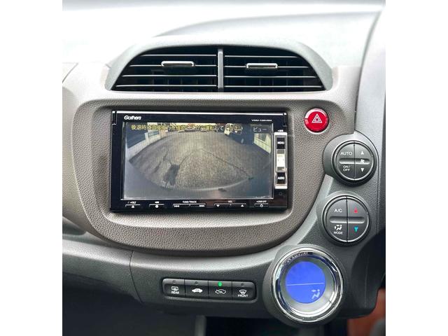 フィットシャトルハイブリッド ハイブリッド ファインライン ETC バックカメラ ナビ TV オートクルーズコントロール 電動格納ミラー CVT 盗難防止システム 衝突安全ボディ アルミホイール CD DVD再生 USB ABS ESC エアコン(51枚目)