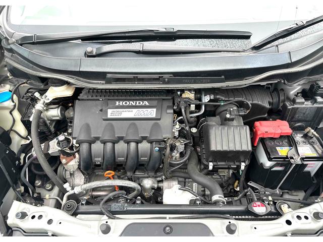 フィットシャトルハイブリッド ハイブリッド ファインライン ETC バックカメラ ナビ TV オートクルーズコントロール 電動格納ミラー CVT 盗難防止システム 衝突安全ボディ アルミホイール CD DVD再生 USB ABS ESC エアコン(53枚目)