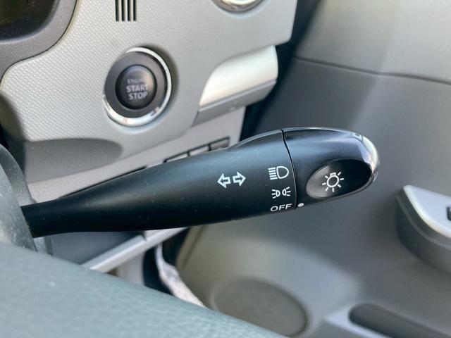 ワゴンＲ ＦＸリミテッドＩＩ　車検Ｒ９．９月　プッシュスタート　スマートキー　オートエアコン　革巻きステアリング　シートリフター　イモビライザー　セキュリティアラーム　チルトステアリング　純正１４ＡＷ　マット　バイザー　禁煙車（24枚目）