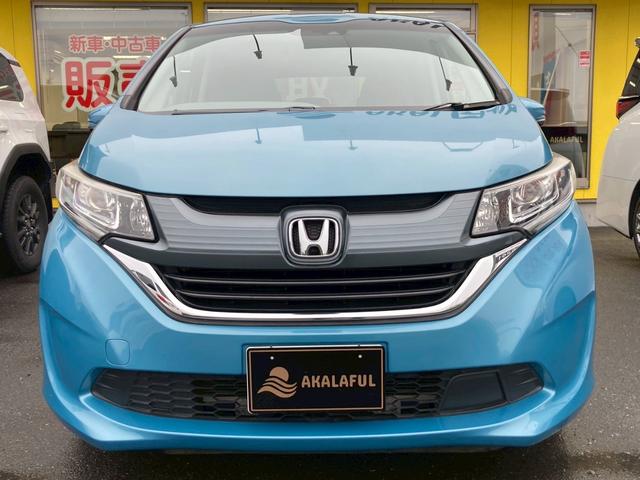 フリード G・ホンダセンシング 純正9インチナビ フリップダウンモニター Cパッケージ LEDヘッドランプ ナビ装着用SP バックモニター 両側パワースライドドア ホンダセンシング コンフォートパッケージ 2列目ベンチシート 禁煙車(4枚目)