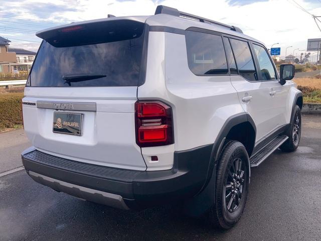 ランドクルーザー２５０ ＶＸ　１２．３型ディスプレイナビ　ムーンルーフ　ルーフレール　セーフティセンス　レザーシート　リフレクター式３眼ＬＥＤヘッドランプ　デジタルインナーミラー　全方位モニター　パワーバックドア　ＢＳＭ　地デジ（7枚目）