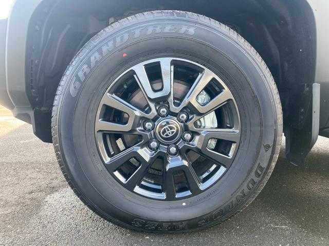 ランドクルーザー２５０ ＶＸ　１２．３型ディスプレイナビ　ムーンルーフ　ルーフレール　セーフティセンス　レザーシート　リフレクター式３眼ＬＥＤヘッドランプ　デジタルインナーミラー　全方位モニター　パワーバックドア　ＢＳＭ　地デジ（65枚目）