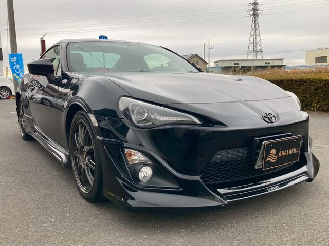 86 GT 純正ナビ バックモニター RSRダウンサス 柿本マフラー RAYS18AW MOMOステアリング TV トルセンLSD クルーズコントロール HIDヘッドランプ プッシュスタート ルーフスポイラー(3枚目)