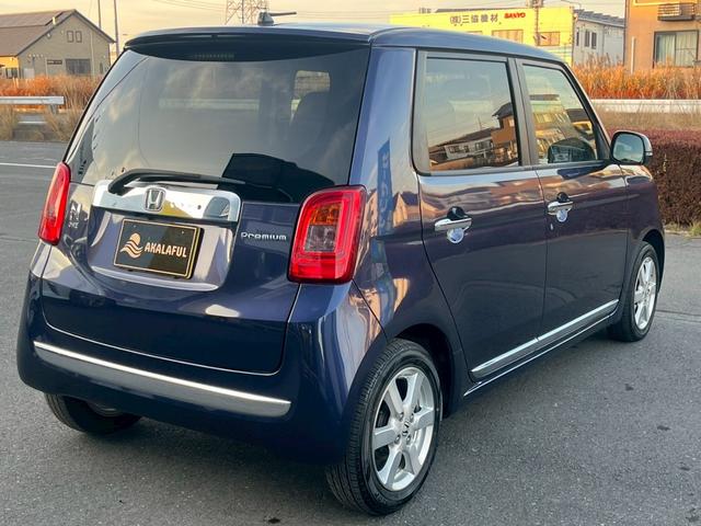 N-ONE プレミアム・Lパッケージ 純正ディスプレイオーディオ (スマートフォン連携) HIDヘッドランプ スマートキー SRSエアバック ドライブレコーダー オートエアコン 純正14AW アイドリングストップシステム 革巻きステア(7枚目)