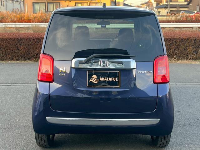 N-ONE プレミアム・Lパッケージ 純正ディスプレイオーディオ (スマートフォン連携) HIDヘッドランプ スマートキー SRSエアバック ドライブレコーダー オートエアコン 純正14AW アイドリングストップシステム 革巻きステア(9枚目)