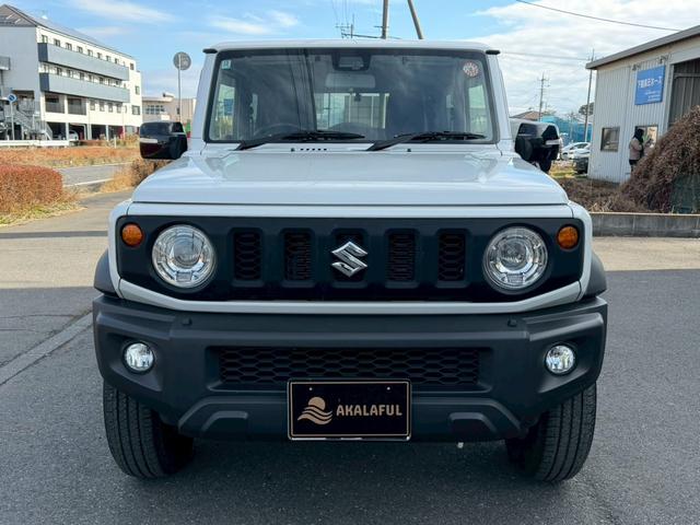 ジムニーシエラ ＪＣ　ナビ　バックモニター　ＴＶ　シートヒーター　背面タイヤ　セーフティサポート　クルーズコントロール　ＬＥＤヘッドランプ　オートライト　純正１５ＡＷ　プッシュスタート　純正シートカバー　禁煙車　バイザー（4枚目）