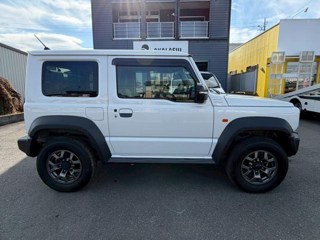 ジムニーシエラ ＪＣ　ナビ　バックモニター　ＴＶ　シートヒーター　背面タイヤ　セーフティサポート　クルーズコントロール　ＬＥＤヘッドランプ　オートライト　純正１５ＡＷ　プッシュスタート　純正シートカバー　禁煙車　バイザー（6枚目）