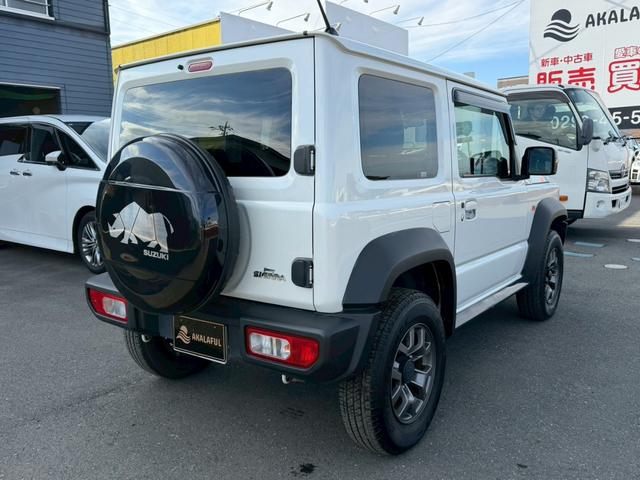 ジムニーシエラ ＪＣ　ナビ　バックモニター　ＴＶ　シートヒーター　背面タイヤ　セーフティサポート　クルーズコントロール　ＬＥＤヘッドランプ　オートライト　純正１５ＡＷ　プッシュスタート　純正シートカバー　禁煙車　バイザー（7枚目）