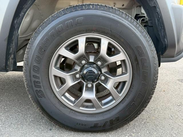 ジムニーシエラ ＪＣ　ナビ　バックモニター　ＴＶ　シートヒーター　背面タイヤ　セーフティサポート　クルーズコントロール　ＬＥＤヘッドランプ　オートライト　純正１５ＡＷ　プッシュスタート　純正シートカバー　禁煙車　バイザー（56枚目）