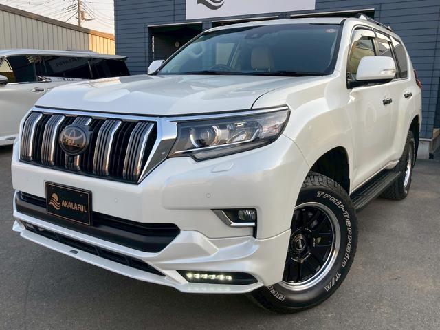 ランドクルーザープラド ＴＸ　Ｌパッケージ　モデリスタエアロ　純正９インチディスプレイナビ　サンルーフ　ベージュレザーシート　全方位モニター　ブラックルーフレール　ＴＲＤマフラー　ＲＡＹＳ１８ＡＷ　セーフティセンス　ＬＥＤヘッドランプ　禁煙車（2枚目）