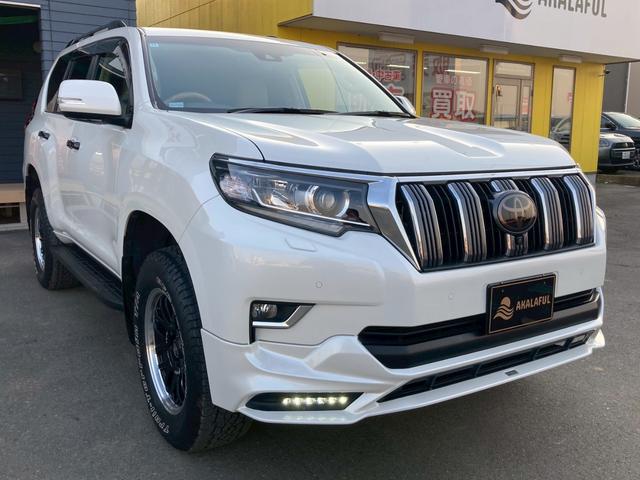 ランドクルーザープラド ＴＸ　Ｌパッケージ　モデリスタエアロ　純正９インチディスプレイナビ　サンルーフ　ベージュレザーシート　全方位モニター　ブラックルーフレール　ＴＲＤマフラー　ＲＡＹＳ１８ＡＷ　セーフティセンス　ＬＥＤヘッドランプ　禁煙車（3枚目）