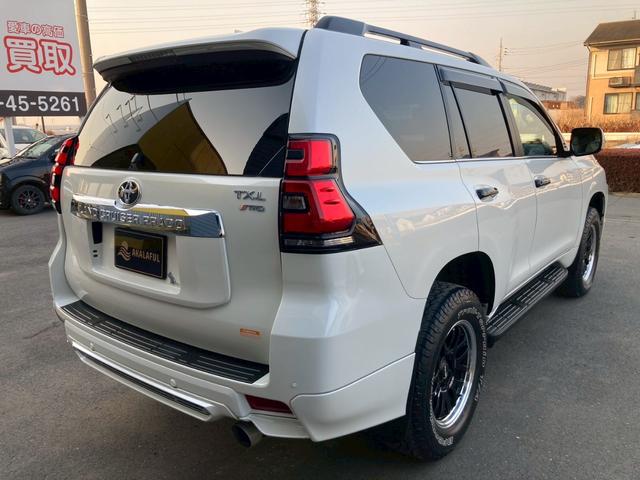 ランドクルーザープラド ＴＸ　Ｌパッケージ　モデリスタエアロ　純正９インチディスプレイナビ　サンルーフ　ベージュレザーシート　全方位モニター　ブラックルーフレール　ＴＲＤマフラー　ＲＡＹＳ１８ＡＷ　セーフティセンス　ＬＥＤヘッドランプ　禁煙車（7枚目）