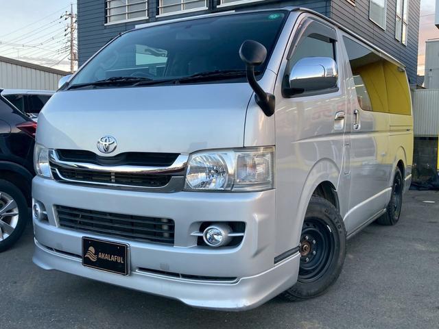 ハイエースバン ロングスーパーＧＬ　フロントリップ　ナビ　ＴＶ　バックモニター　ＡＣ１００Ｖ電源　寒冷地仕様　オートライト　ランプ付きスライドドアステップ　ＳＲＳエアバック　リアクーラー　リアヒーター　イモビライザー　パワーウィンドウ（2枚目）