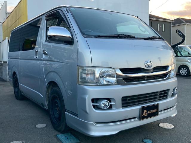 ハイエースバン ロングスーパーＧＬ　フロントリップ　ナビ　ＴＶ　バックモニター　ＡＣ１００Ｖ電源　寒冷地仕様　オートライト　ランプ付きスライドドアステップ　ＳＲＳエアバック　リアクーラー　リアヒーター　イモビライザー　パワーウィンドウ（3枚目）