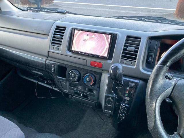 ハイエースバン ロングスーパーＧＬ　フロントリップ　ナビ　ＴＶ　バックモニター　ＡＣ１００Ｖ電源　寒冷地仕様　オートライト　ランプ付きスライドドアステップ　ＳＲＳエアバック　リアクーラー　リアヒーター　イモビライザー　パワーウィンドウ（23枚目）