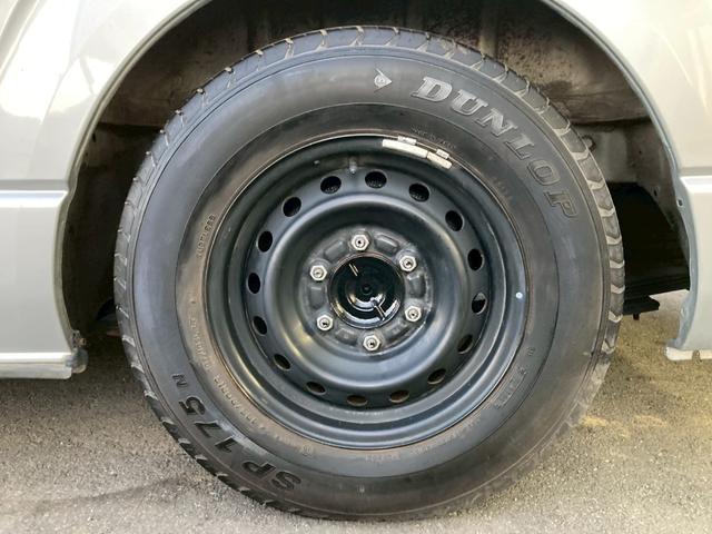 ハイエースバン ロングスーパーＧＬ　フロントリップ　ナビ　ＴＶ　バックモニター　ＡＣ１００Ｖ電源　寒冷地仕様　オートライト　ランプ付きスライドドアステップ　ＳＲＳエアバック　リアクーラー　リアヒーター　イモビライザー　パワーウィンドウ（57枚目）