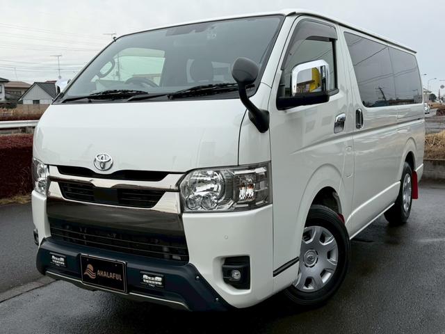 ハイエースバン スーパーＧＬ　ダークプライムＩＩ　純正ナビ　両側パワースライドドア　パノラミックビューモニター　セーフティセンス　ＴＲＤフロントスポイラー　ＴＲＤマッドフラップ　ＡＣ１００Ｖ電源　ＴＶ　プッシュスタート　リアヒータークーラー　禁煙車（2枚目）