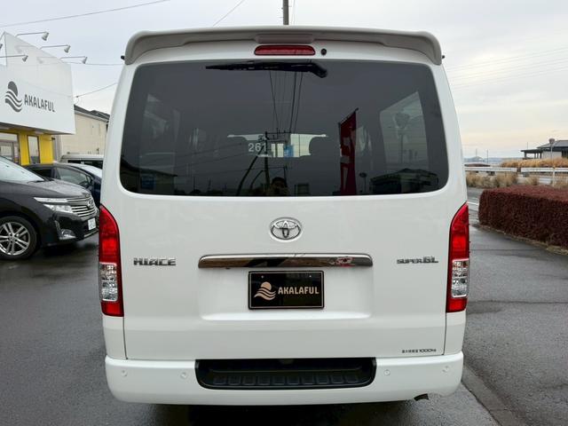 ハイエースバン スーパーＧＬ　ダークプライムＩＩ　純正ナビ　両側パワースライドドア　パノラミックビューモニター　セーフティセンス　ＴＲＤフロントスポイラー　ＴＲＤマッドフラップ　ＡＣ１００Ｖ電源　ＴＶ　プッシュスタート　リアヒータークーラー　禁煙車（9枚目）