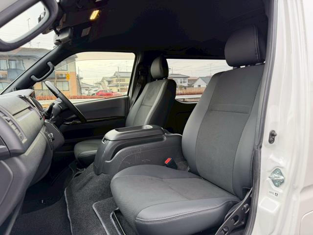 ハイエースバン スーパーＧＬ　ダークプライムＩＩ　純正ナビ　両側パワースライドドア　パノラミックビューモニター　セーフティセンス　ＴＲＤフロントスポイラー　ＴＲＤマッドフラップ　ＡＣ１００Ｖ電源　ＴＶ　プッシュスタート　リアヒータークーラー　禁煙車（12枚目）