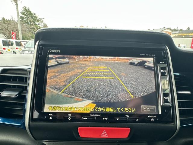 Ｎ－ＢＯＸ＋ ２トーンカラースタイル　Ｇ　ＳＳパッケージ　ナビ／ワンセグＴＶ／ＥＴＣ／バックカメラ／ＤＶＤ／ドアバイザー／両側電動スライドドア／スマートキー／オーバーヘッドコンソール／電動格納ミラー／アイドリングストップ／横滑り防止装置／ｉＰｏｄ／ＣＤ（4枚目）