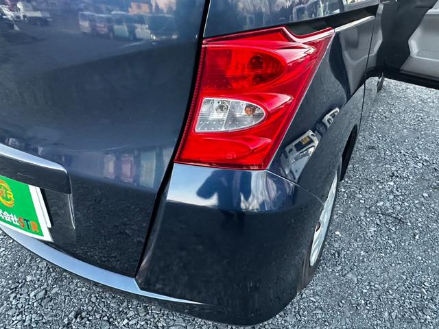 フリード Ｇ　ジャストセレクション　ナビ／ワンセグＴＶ／ＥＴＣ／バックカメラ／スマートキー／両側スライド片側電動ドア／３列シート／ウォークスルー／ドアバイザー／電動格納ミラー／パワステ／パワーウインドウ／ＤＶＤ／ＣＤ／ＵＳＢ／ＭＰ３（68枚目）