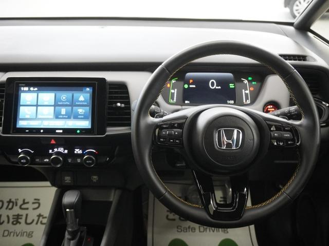 フィット e:HEVRS 当社デモカー純正8インチオーディオLEDオートライトオートハイビーム衝突軽減ブレーキ誤発進抑制機能渋滞追従機能付きACCレーンキープアシストサイドエアバッグサイドカーテンエアバッグ パワーウィンドウ(13枚目)