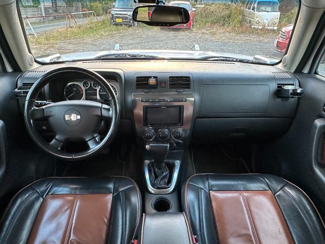 ハマーＨ３ 　ＨＩＤヘッドライト　左ハンドル　サンルーフ　皮シート　シートヒーター　パワーシート　３ナンバー　禁煙車　純正アルミホイール　スタッドレスタイヤ　ナビ　ＴＶ　Ｂカメラ（25枚目）