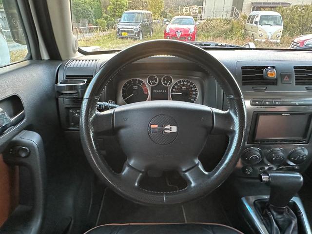 ハマーＨ３ 　ＨＩＤヘッドライト　左ハンドル　サンルーフ　皮シート　シートヒーター　パワーシート　３ナンバー　禁煙車　純正アルミホイール　スタッドレスタイヤ　ナビ　ＴＶ　Ｂカメラ（26枚目）