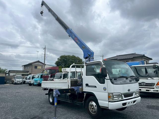 コンドル 標準ロング平ボディ４段クレーンラジコン付２．９ｔ積載３ｔ　（いすゞエルフ）☆最大積載量：３０００ｋｇ☆上物メーカー：タダノ製　年式：２００３年１２月製　２．９３ｔ吊り　ラジコン付き（送信機・受信機有り）☆ＮＯｘ・ＰＭ適合車！！　☆煤焼きなし☆生エンジン☆鉄床（4枚目）