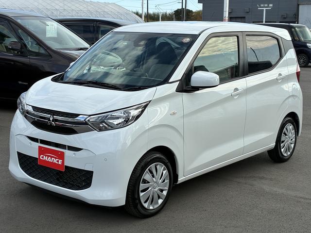 eKワゴン M 社外ナビ ETC コーナーセンサー オートライト CD DVD ステアリングスイッチ 電動格納ミラー キーレス アイドリングストップ ベンチシート 助手席エアーバック フロアマット(4枚目)