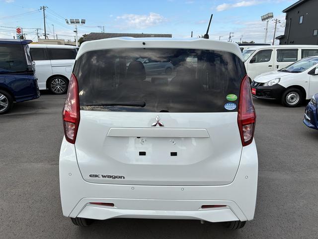 eKワゴン M 社外ナビ ETC コーナーセンサー オートライト CD DVD ステアリングスイッチ 電動格納ミラー キーレス アイドリングストップ ベンチシート 助手席エアーバック フロアマット(9枚目)