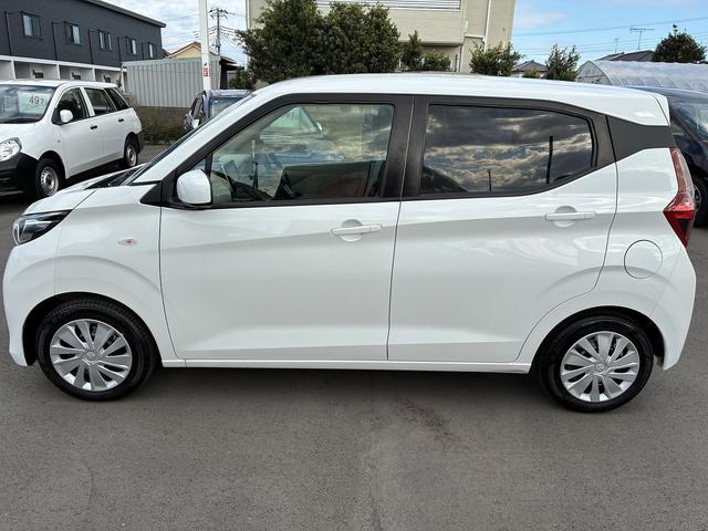 eKワゴン M 社外ナビ ETC コーナーセンサー オートライト CD DVD ステアリングスイッチ 電動格納ミラー キーレス アイドリングストップ ベンチシート 助手席エアーバック フロアマット(11枚目)