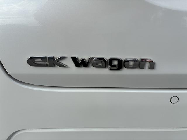 eKワゴン M 社外ナビ ETC コーナーセンサー オートライト CD DVD ステアリングスイッチ 電動格納ミラー キーレス アイドリングストップ ベンチシート 助手席エアーバック フロアマット(56枚目)