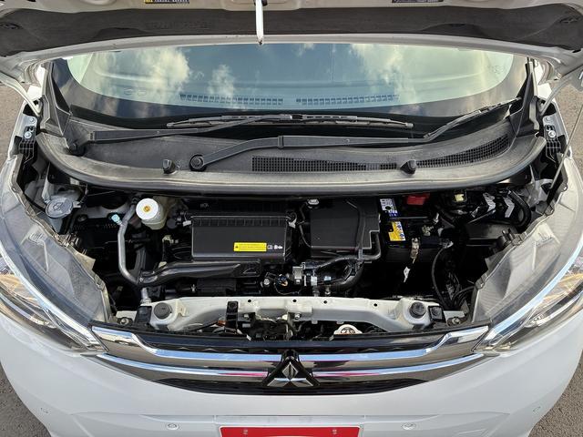 eKワゴン M 社外ナビ ETC コーナーセンサー オートライト CD DVD ステアリングスイッチ 電動格納ミラー キーレス アイドリングストップ ベンチシート 助手席エアーバック フロアマット(58枚目)