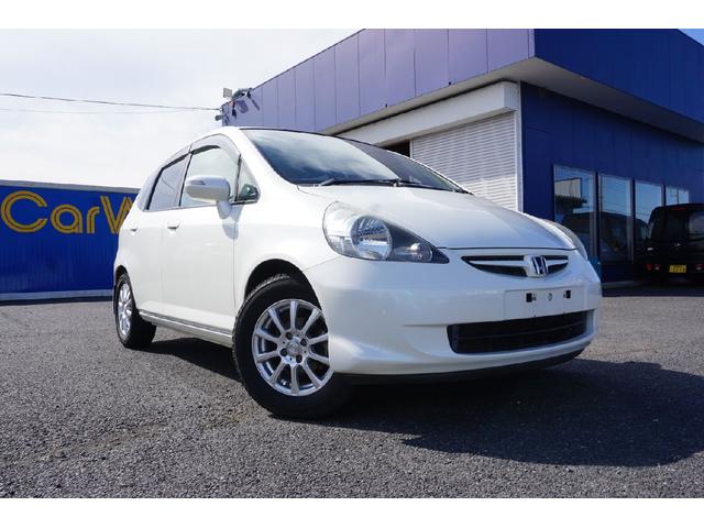 フィット コンフォートエディション ETC ナビ アルミホイール キーレスエントリー CVT 盗難防止システム 衝突安全ボディ ABS エアコン パワーステアリング パワーウィンドウ(4枚目)