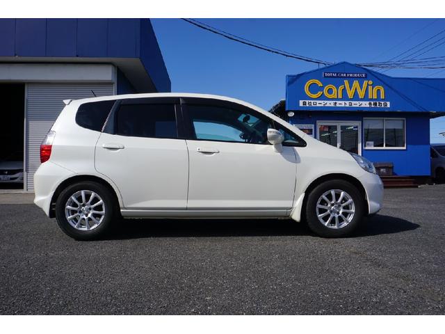 フィット コンフォートエディション ETC ナビ アルミホイール キーレスエントリー CVT 盗難防止システム 衝突安全ボディ ABS エアコン パワーステアリング パワーウィンドウ(5枚目)
